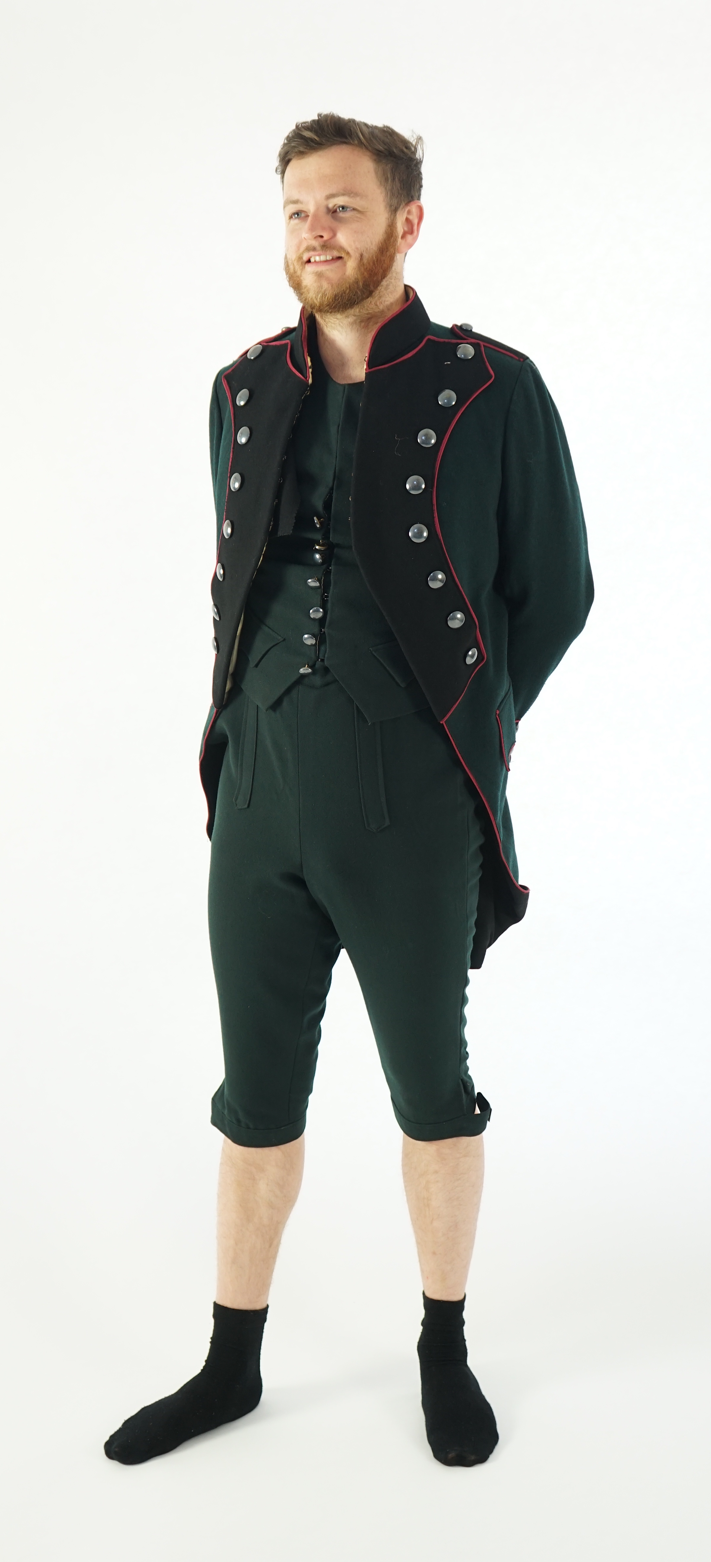 A dark green and black 18th Century style military uniform (jacket, waistcoat and breeches). Ex Royal Opera House - Soldier 'The Barber of Seville' 1993